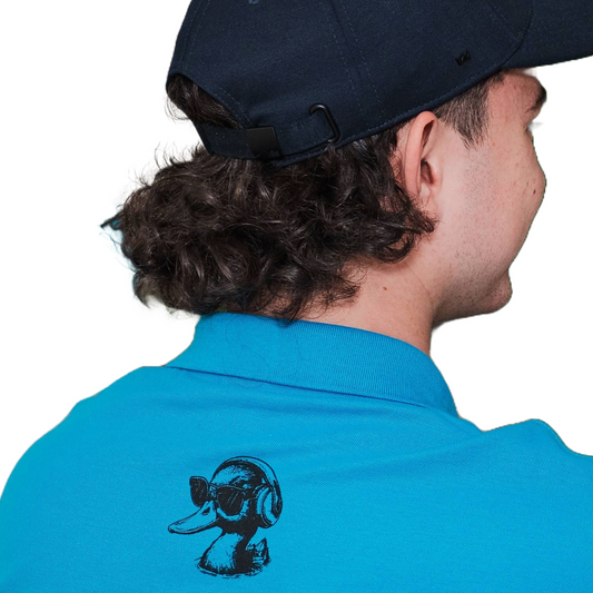 Person wearing a blue polo shirt with a logo on the back, facing away from the camera.
