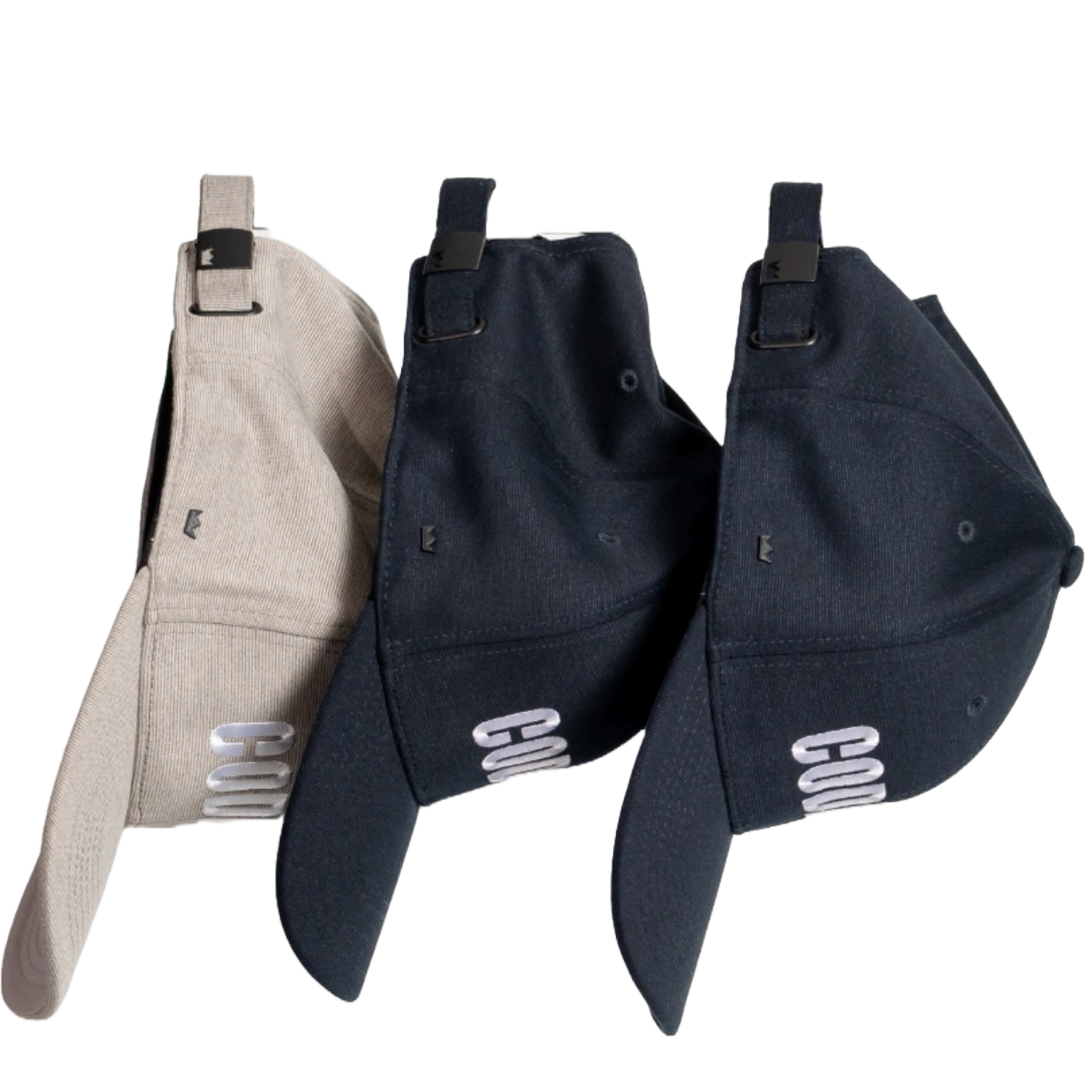 Three baseball caps in beige, black, and navy with 'COOL' branding on a white background