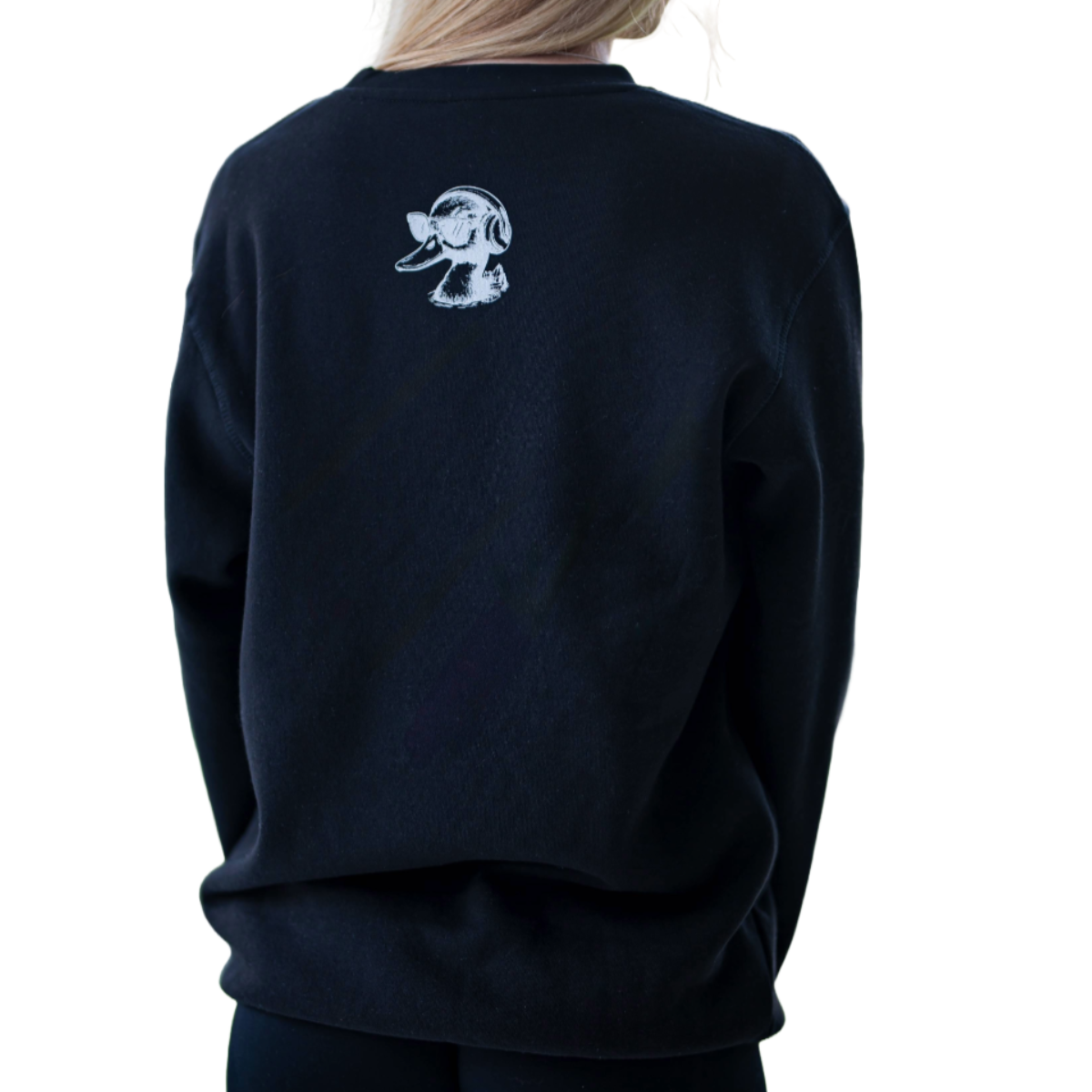 Black sweatshirt with a white graphic on the back, worn by a person.
