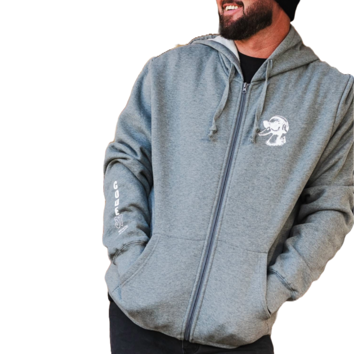 Man wearing a gray hoodie and black beanie with visible branding on a white background