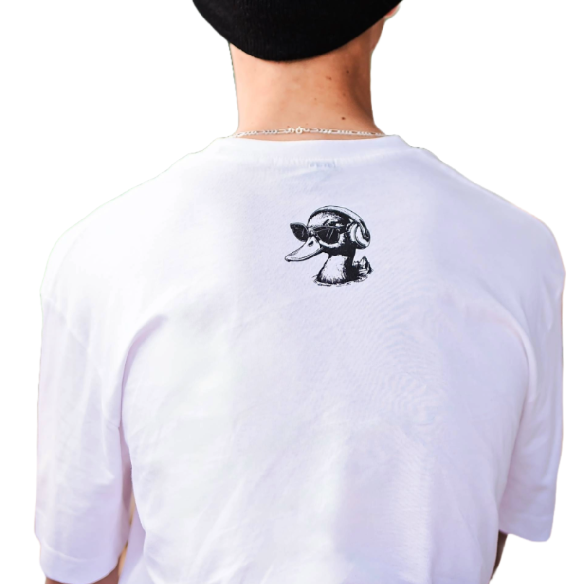 White t-shirt with a black graphic on the back, worn by a person.