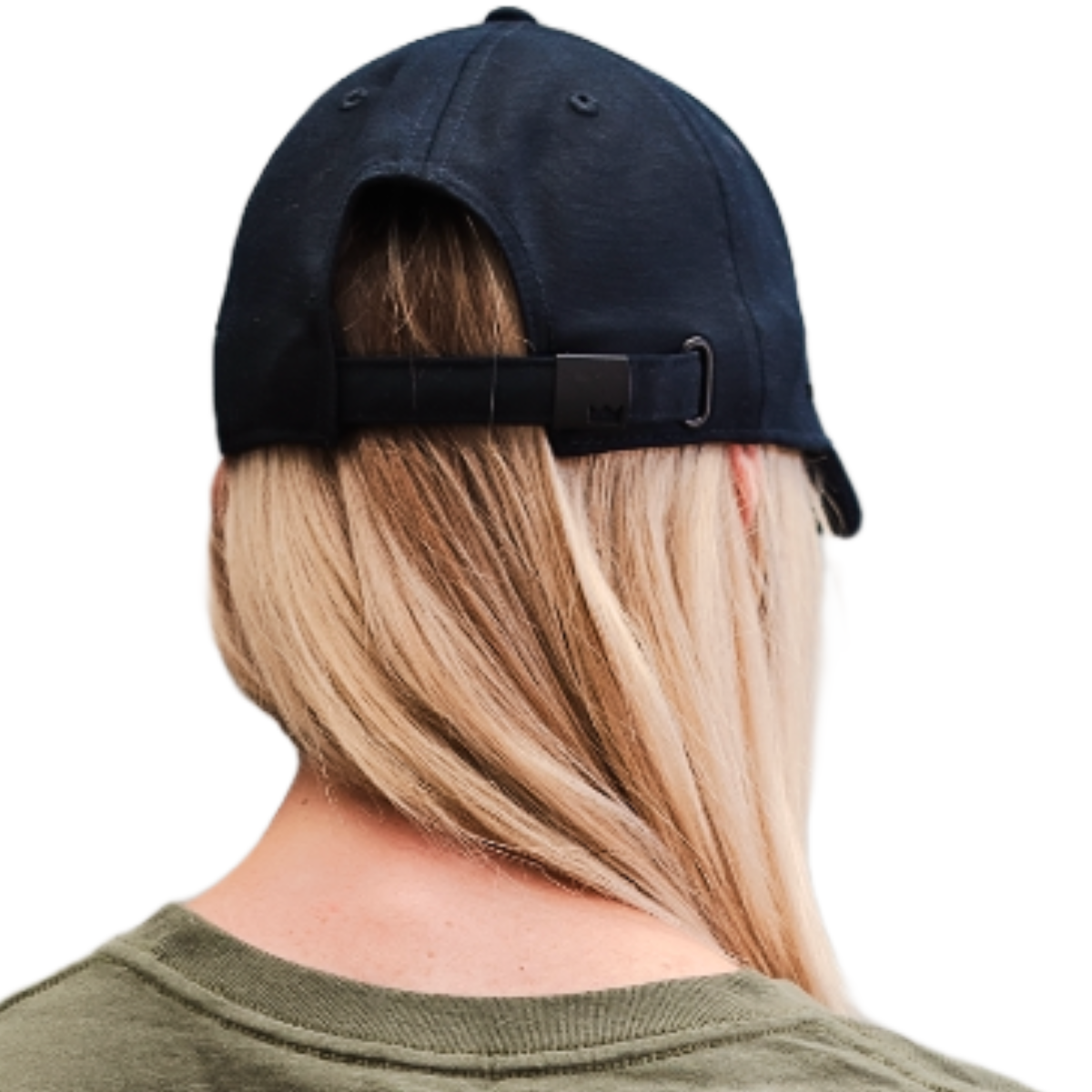 Person wearing a navy blue cap with a black strap on a white background