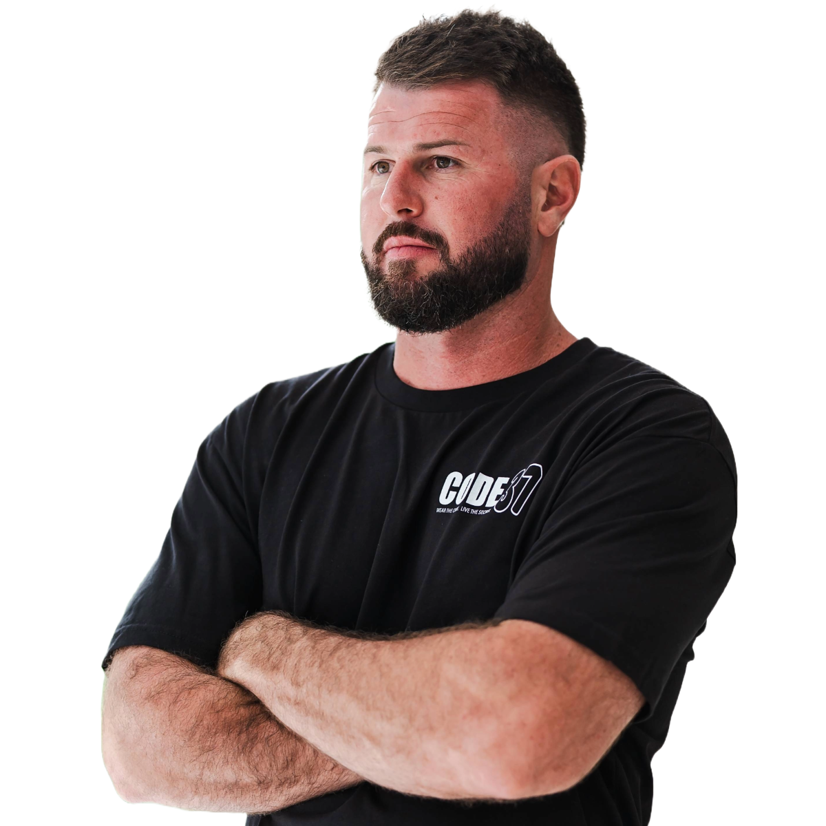 Man wearing a black t-shirt with a logo on a white background